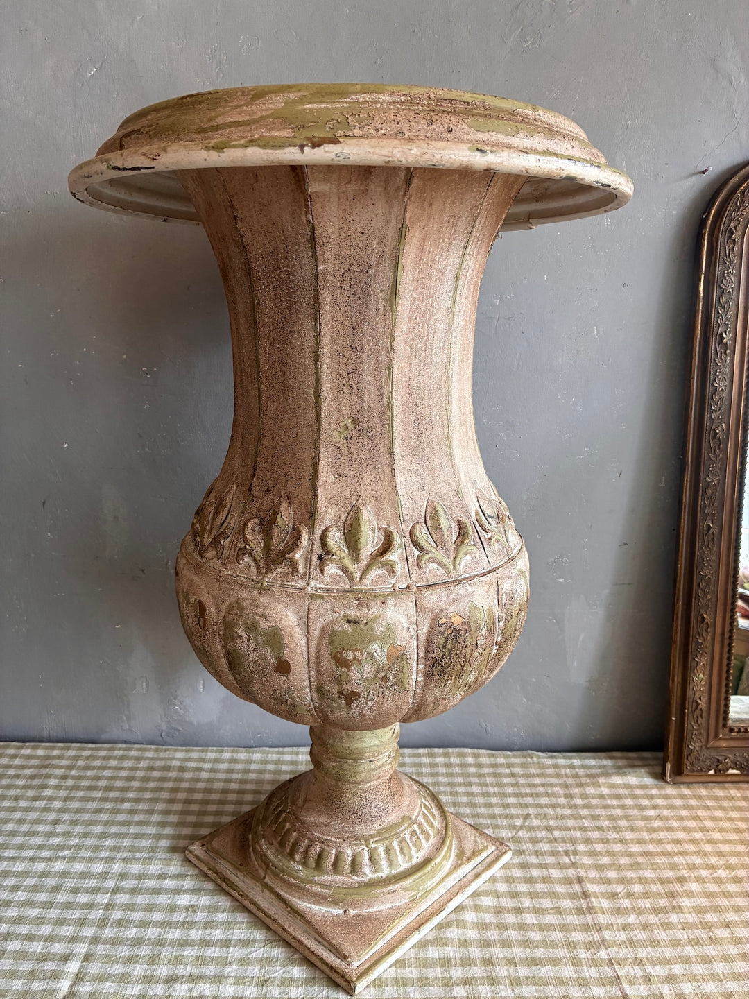 Medici Style Urn Planter showcasing a vintage fluted design with decorative relief detailing.