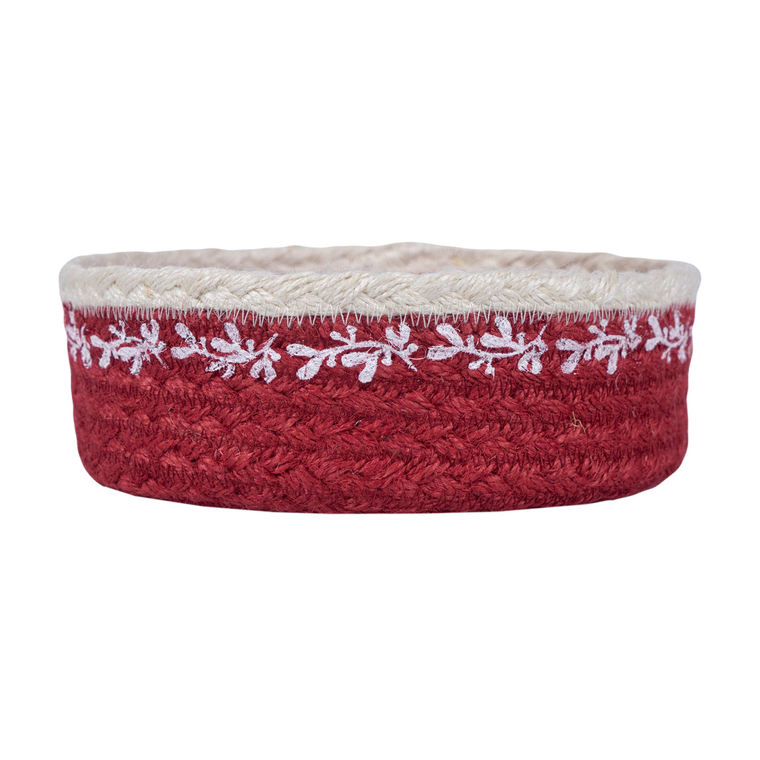 Christmas Red Berry Jute Mini Basket with white mistletoe pattern on red backdrop, perfect for festive decorations.