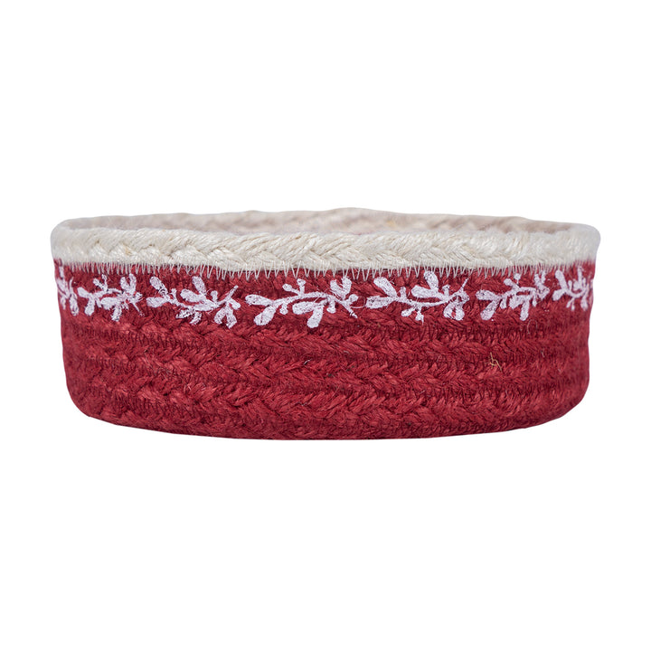 Christmas Red Berry Jute Mini Basket with white mistletoe pattern on red backdrop, perfect for festive decorations.