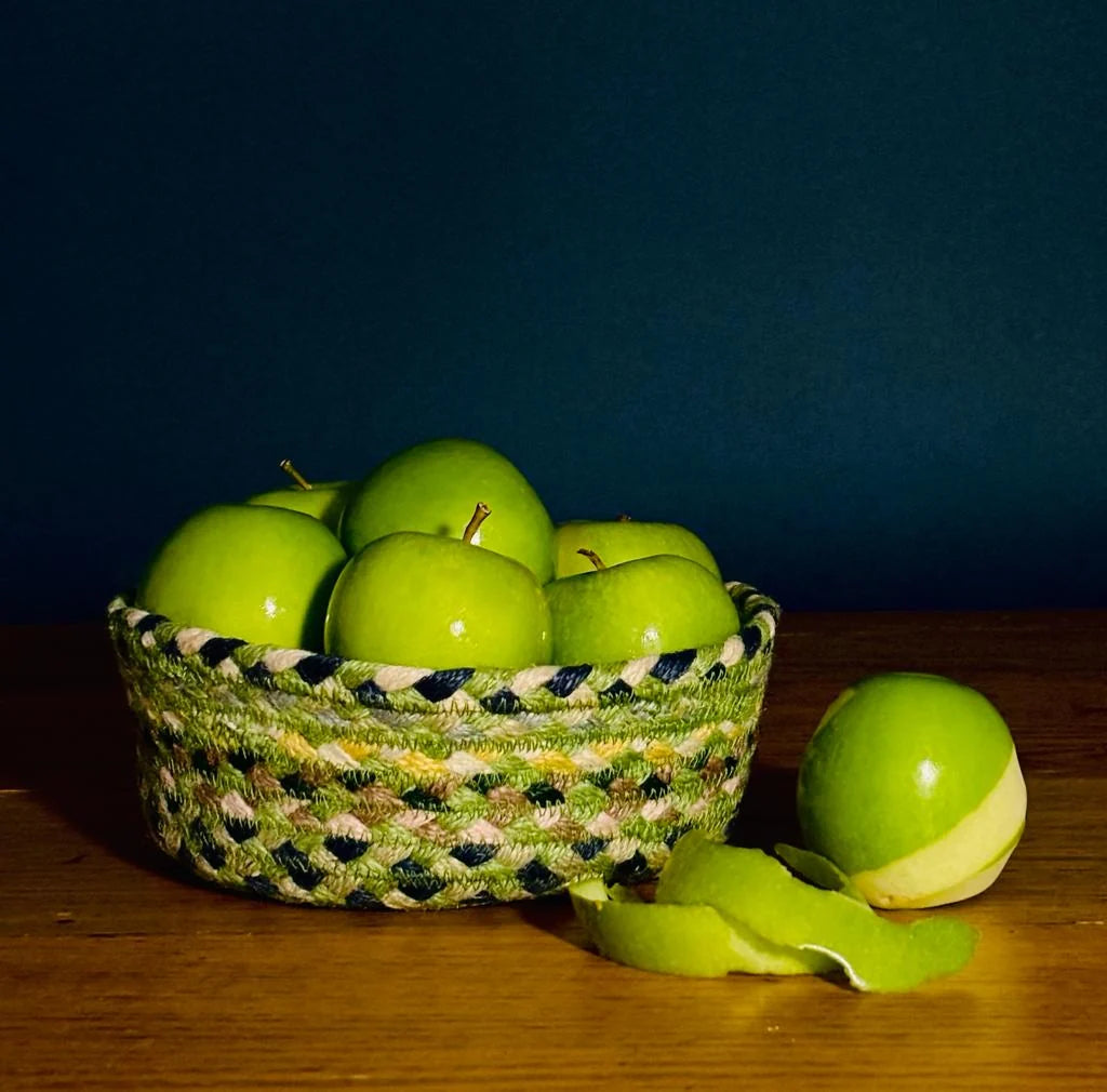 Mint Green Jute Mini Basket filled with green apples on a wooden table, decorative and functional piece.