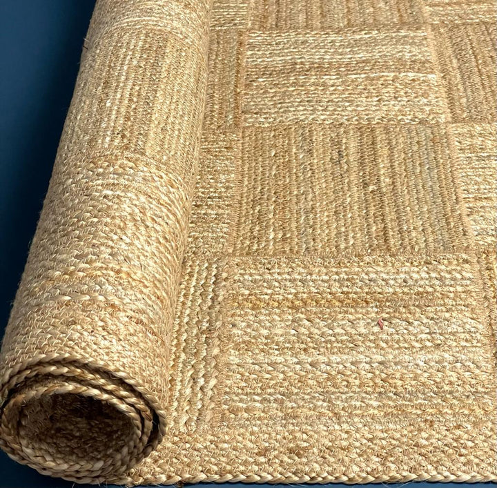 Stylish Natural Jute rug in a tile design for sale at Source for the Goose, Devon, UK