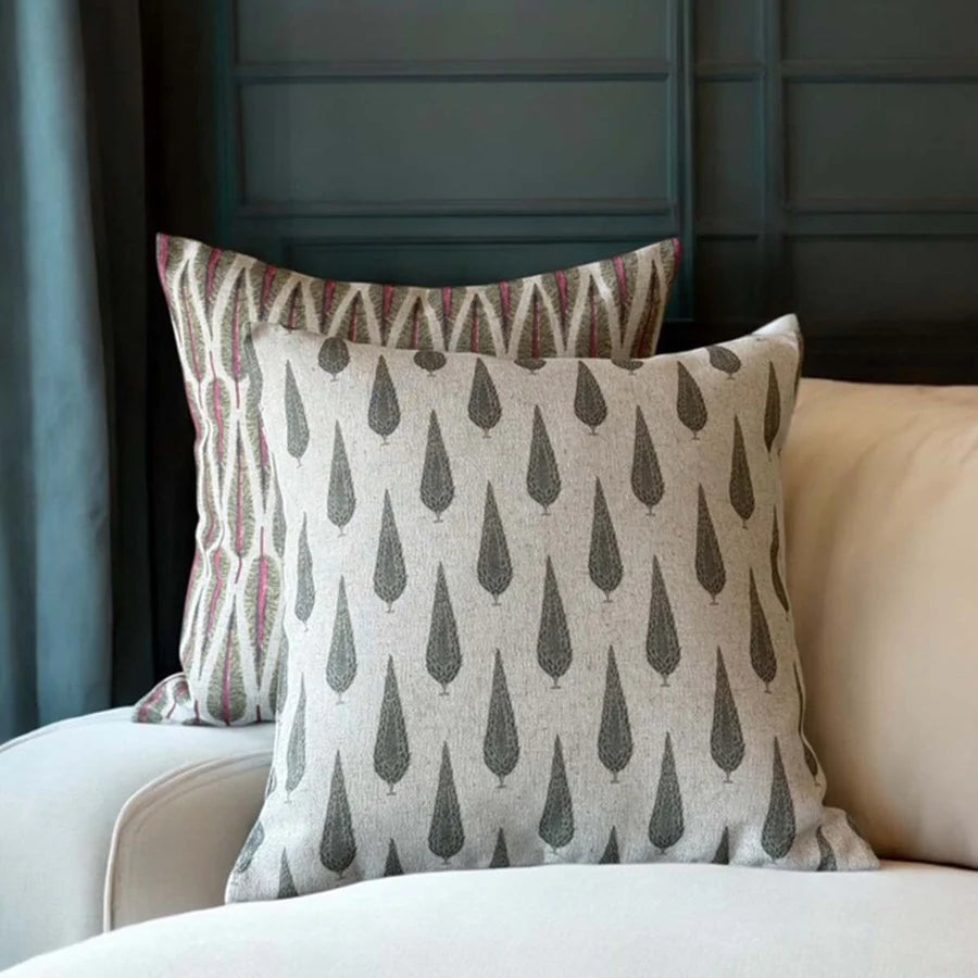 Pine Grove Eucalyptus Cushion with conifer tree pattern on textured fabric, enhancing vintage home décor.
