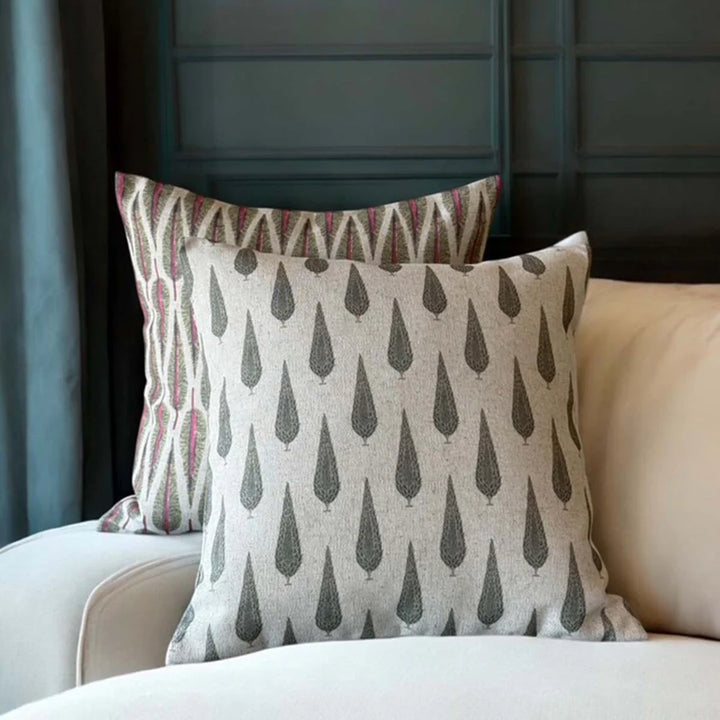 Pine Grove Eucalyptus Cushion with conifer tree pattern on textured fabric, enhancing vintage home décor.