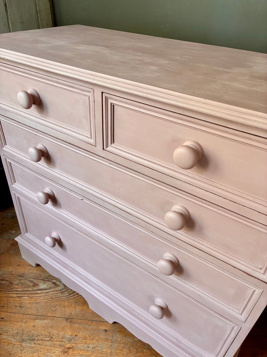 Soft Pink Chest of Drawers with handpainted finish and two-over-three drawer configuration.