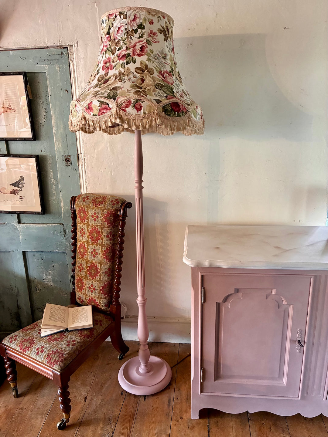 Pink Standard Lamp with Chintz Shade beside vintage chair and table, beautifully restored and styled.