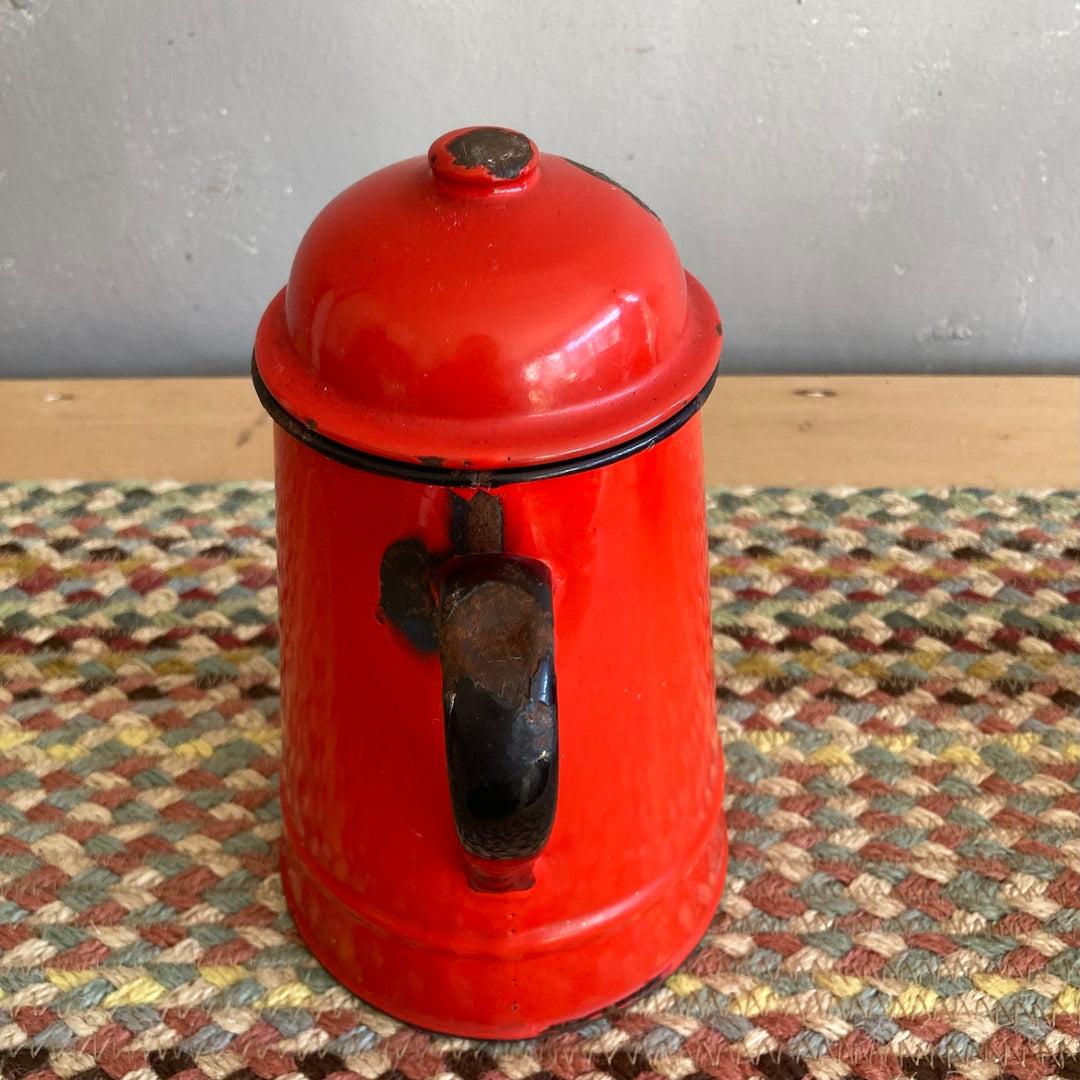 Vintage red enamel tea and coffee pot from Source for the Goose Devon, perfect for rustic kitchen decor.