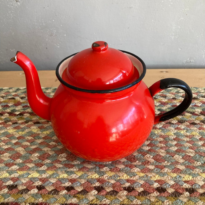 Vintage red enamel teapot from Source for the Goose Devon, perfect for adding rustic charm to your kitchen.
