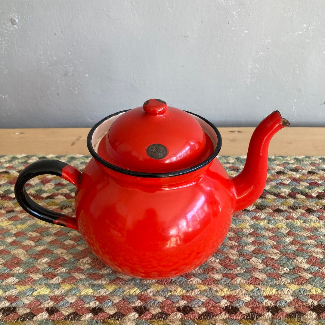 Vintage red enamel tea and coffeepot from Source for the Goose Devon, perfect for adding charm to country kitchens.
