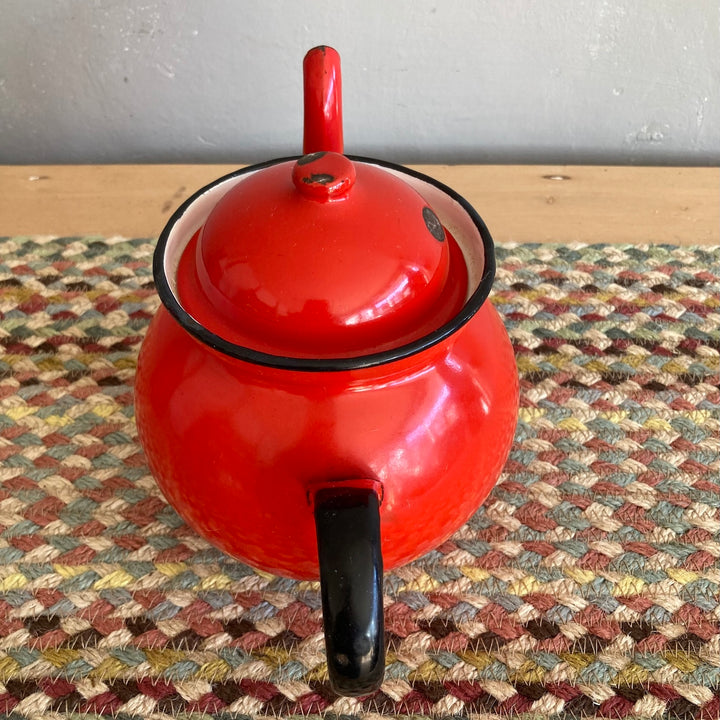 Vintage red enamel tea and coffeepot, perfect for adding rustic charm to your kitchen decor from Source for the Goose.