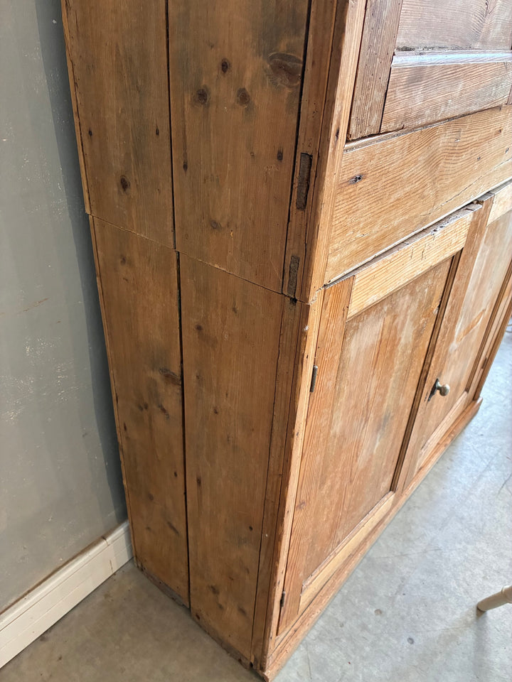 Tall Rustic Pine Housekeepers Cupboard showing detailed wood grain and craftsmanship.