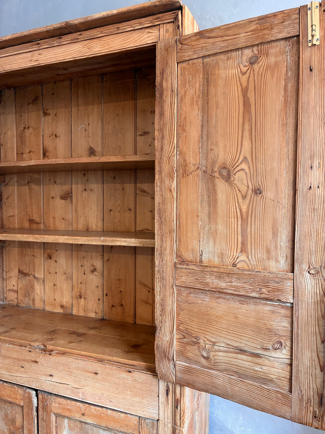Tall Rustic Pine Housekeepers Cupboard showcasing rustic wood texture and antique design.