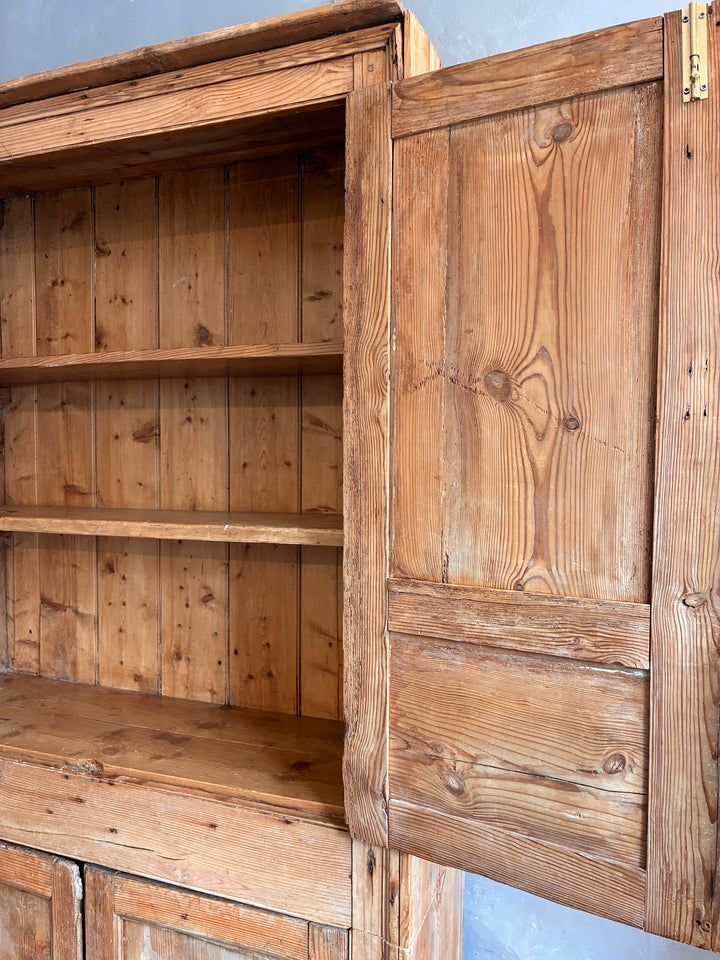 Tall Rustic Pine Housekeepers Cupboard showcasing rustic wood texture and antique design.
