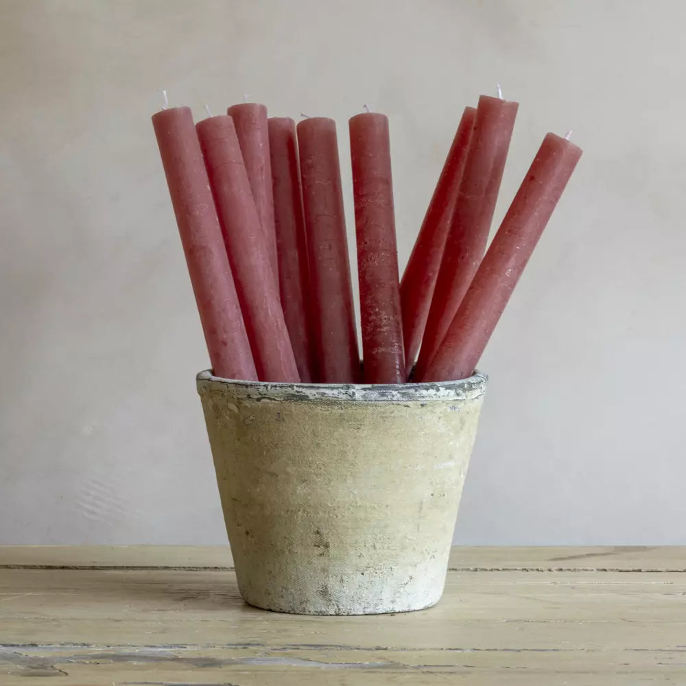 Set of Three Rustic Dusky Pink Dinner Candles displayed in a vintage pot, adding warmth to any interior.