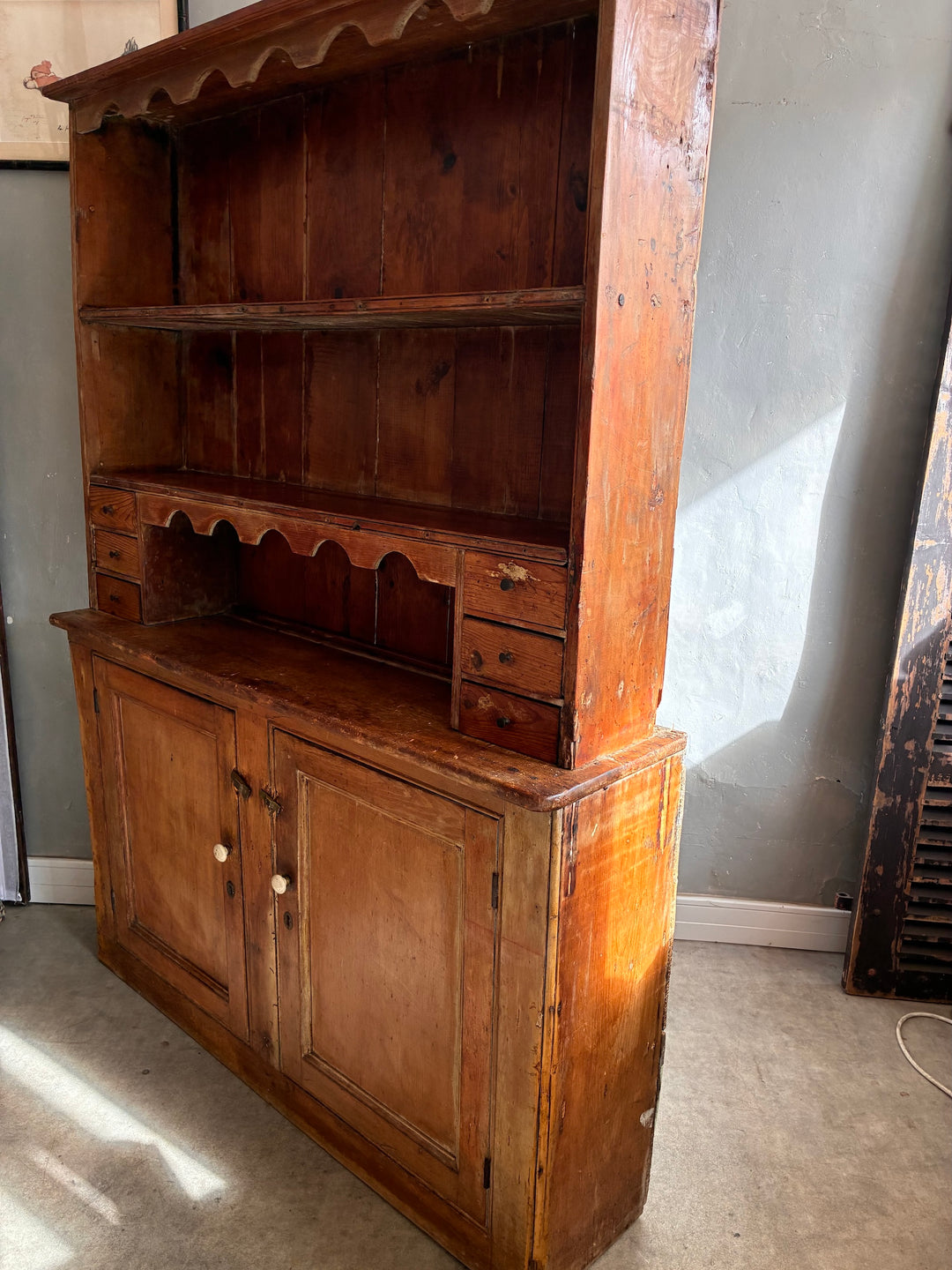 Rustic Antique Pine Dresser featuring a plate rack and cupboard, ideal for country kitchens, Source for the Goose Devon.