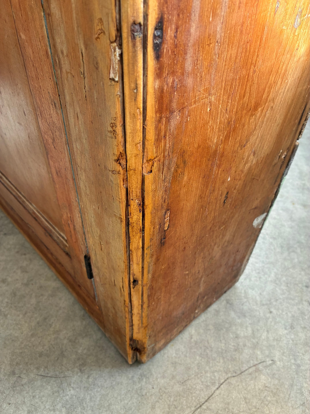 Close-up of the Rustic Antique Pine Dresser showing the aged wood finish and corner craftsmanship.