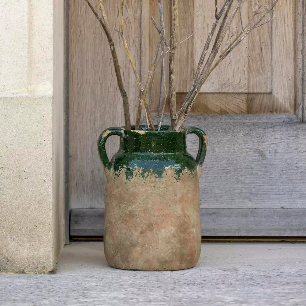 Rustic vase with green glaze from Source for the Goose in Devon, perfect for vintage decor and adding warmth to any space.