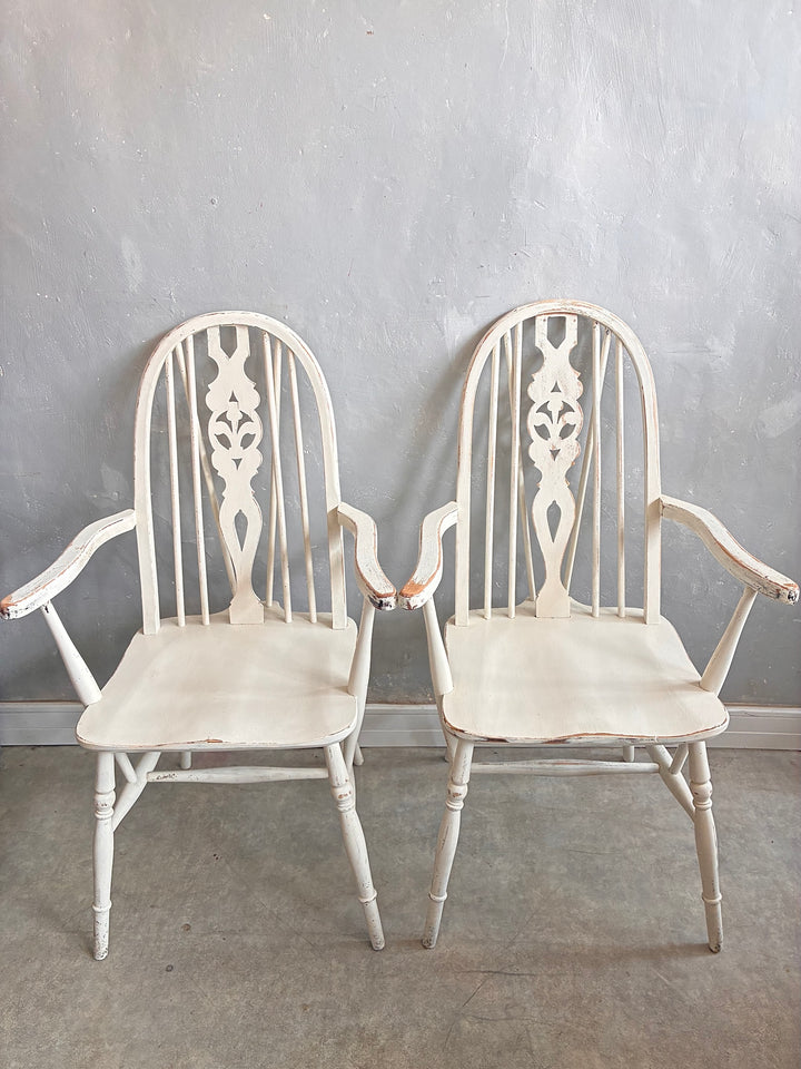 Set of Four Painted Wheelback Carver Chairs with carved wheel motif and warm white finish, from Source for the Goose Devon.