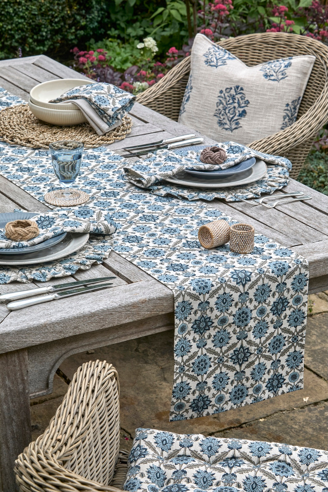 Blue and White Kelmscott Napkin - Set of Four on a beautifully set table with coordinating decor.