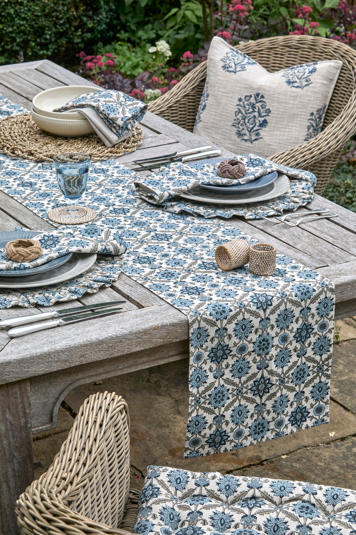 Blue and White Kelmscott Napkin - Set of Four on a beautifully set table with coordinating decor.
