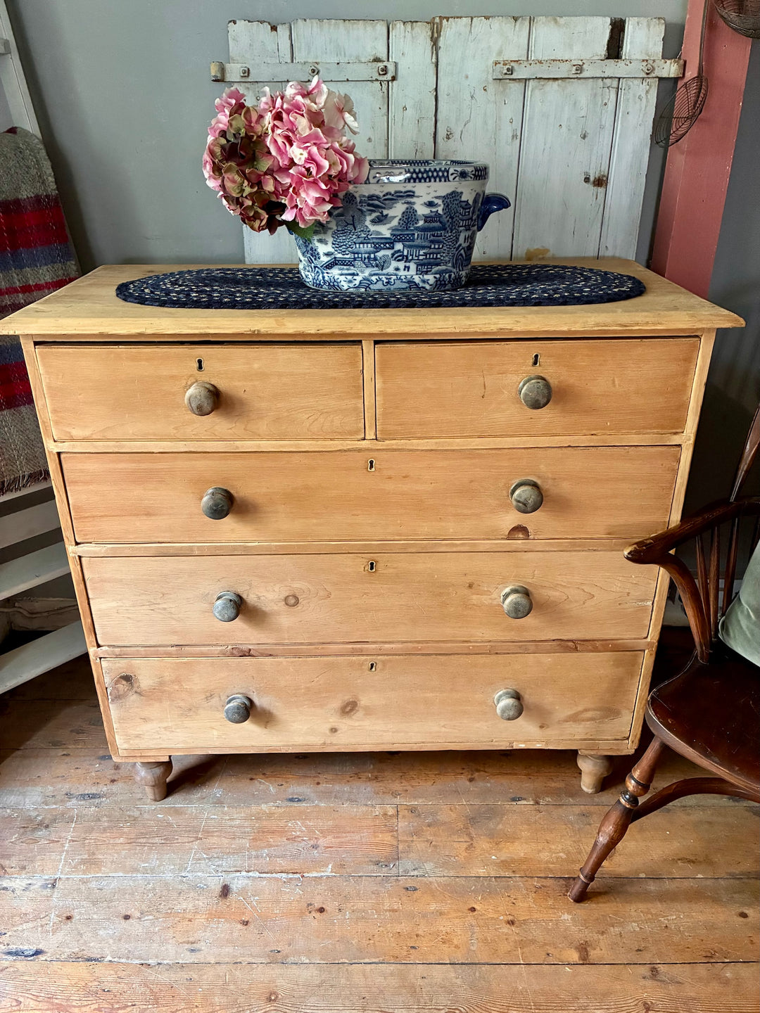 Tall Rustic Antique Pine Chest of Drawers showcasing classic design with original knobs and ample storage.