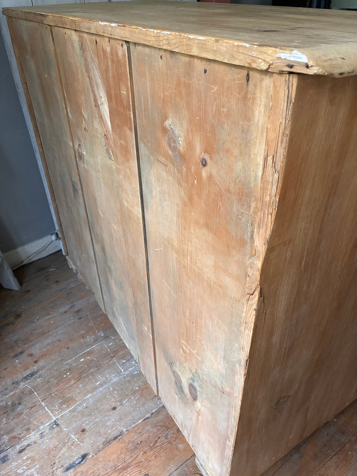 Tall Rustic Antique Pine Chest of Drawers showing beautiful natural wood finish and craftsmanship.
