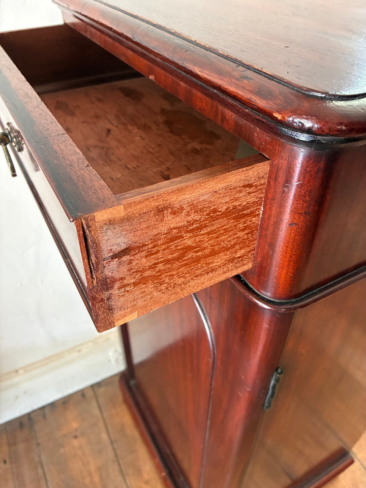 Tall Victorian Mahogany Pot Cupboard drawer open, showcasing rich antique mahogany craftsmanship, perfect for storage.