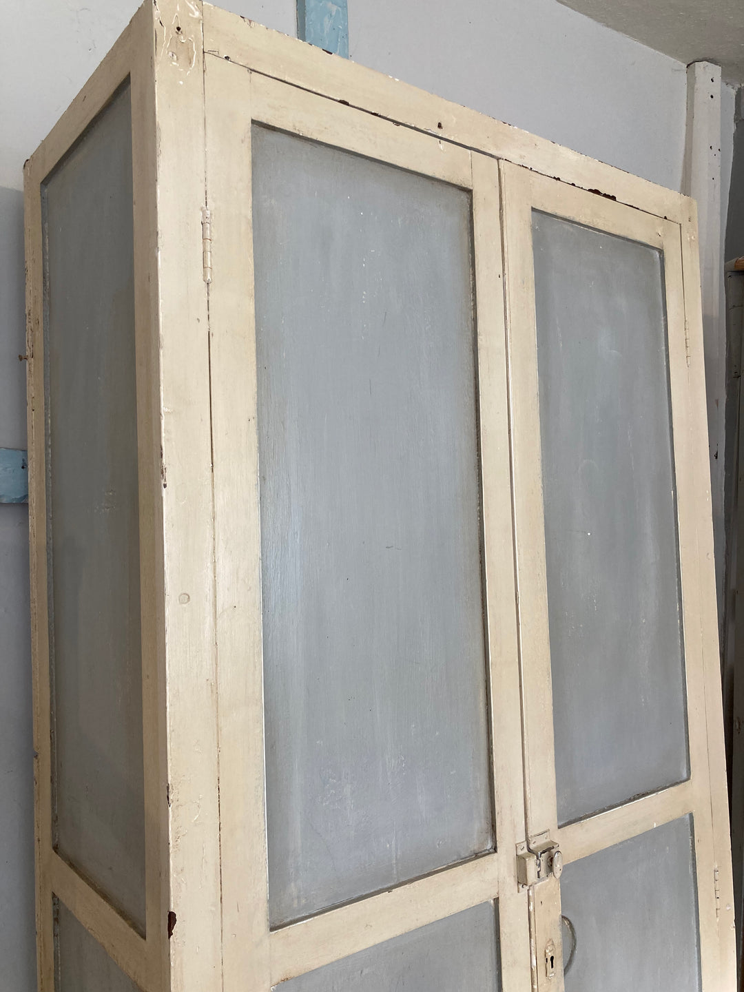 pale blue and distressed white chippy painted cupboard