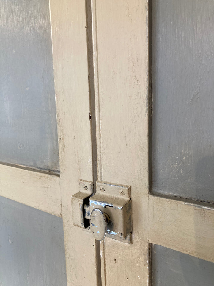 original lock on tall painted cupboard