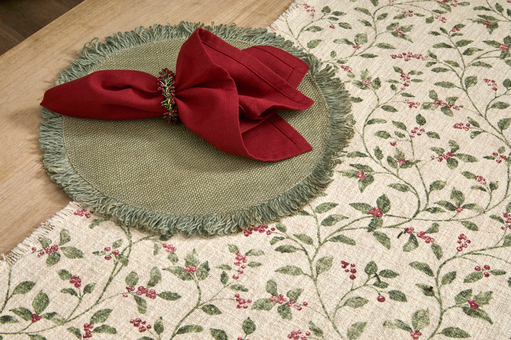 Trailing Berry Christmas Table Runner - Slub Cotton with a red napkin on a green placemat, perfect for holiday dining.