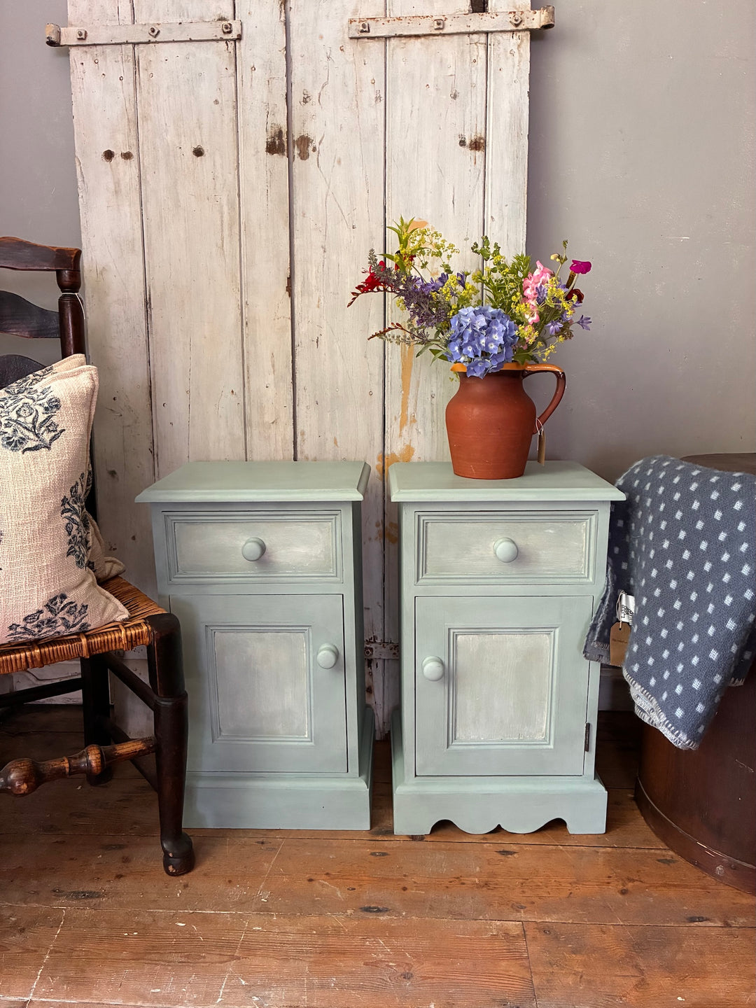 Pair of Painted Pine Bedside Cabinets in Scandi Blue from Source for the Goose Devon, featuring drawers and cupboard.