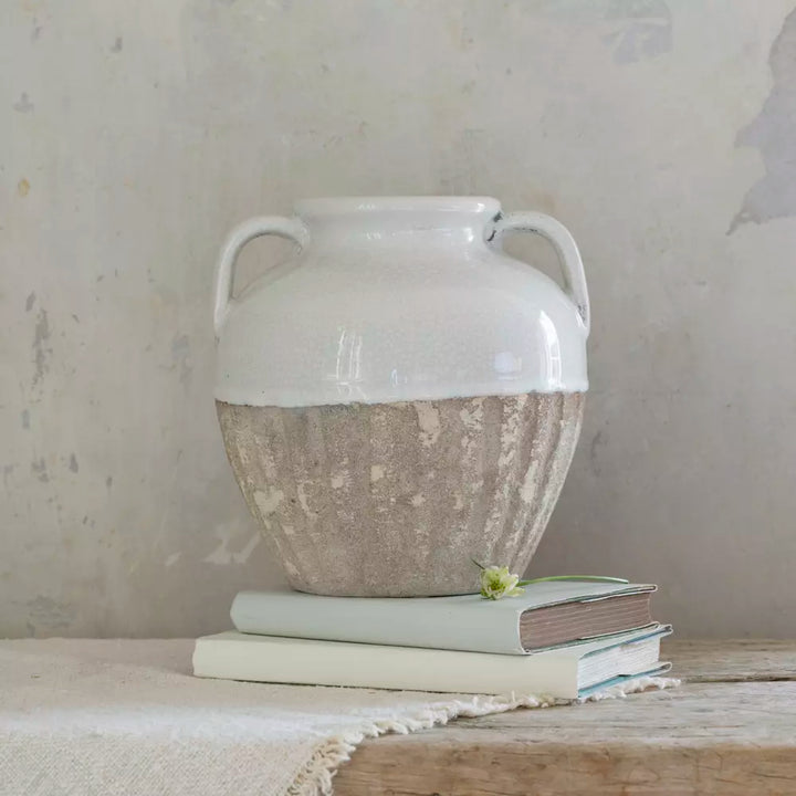 Small Antique White Amphora Vase with textured earthy base and glazed white top, perfect for decor.