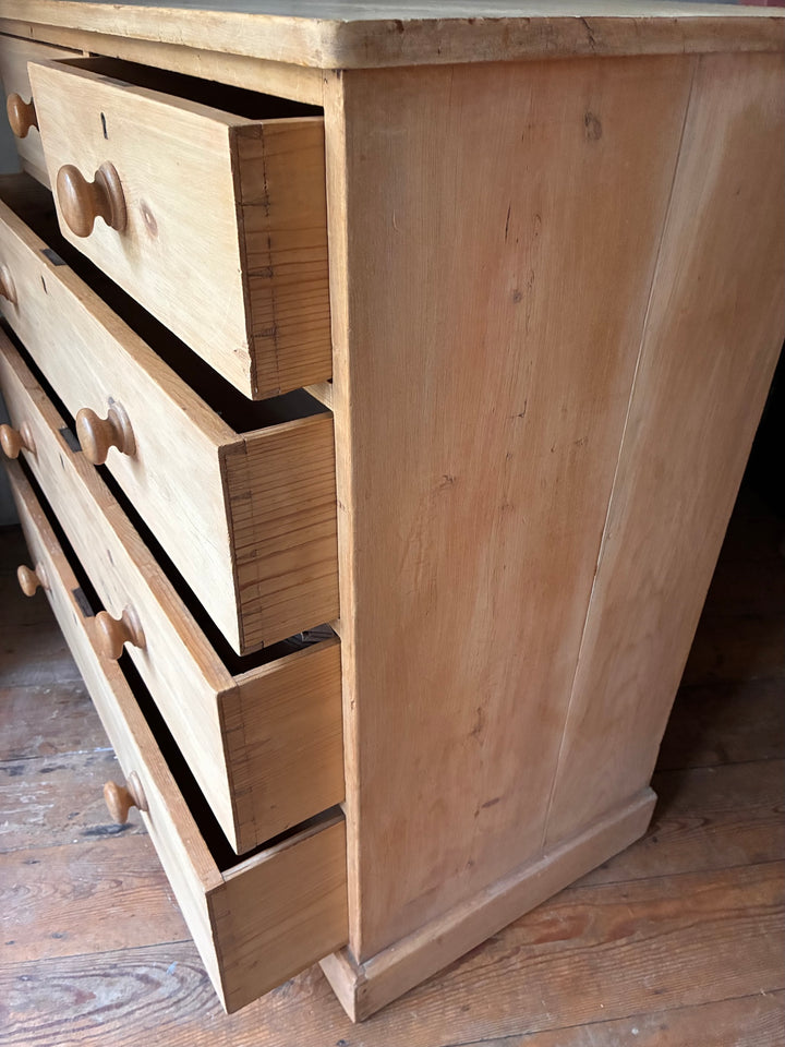 Victorian Antique Pine Chest of Drawers showcasing its simple design and natural wood grain.