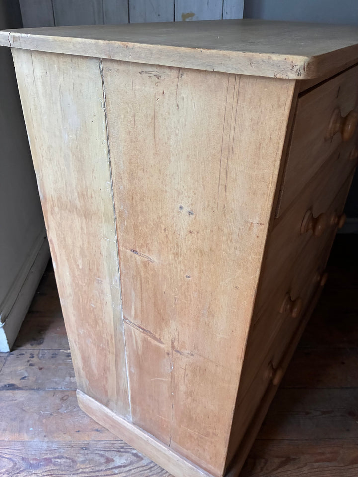 Victorian Antique Pine Chest of Drawers side view showcasing its natural grain and classic design.