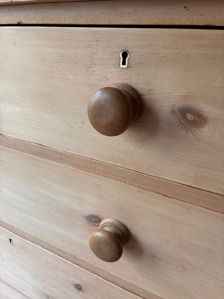 Detail of knobs and keyhole on Victorian Antique Pine Chest of Drawers from Source for the Goose Devon.