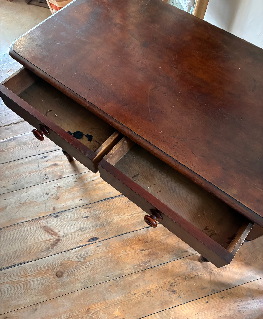 Top view of Victorian Mahogany Console Table with two open drawers, showcasing rich finish and elegant design.