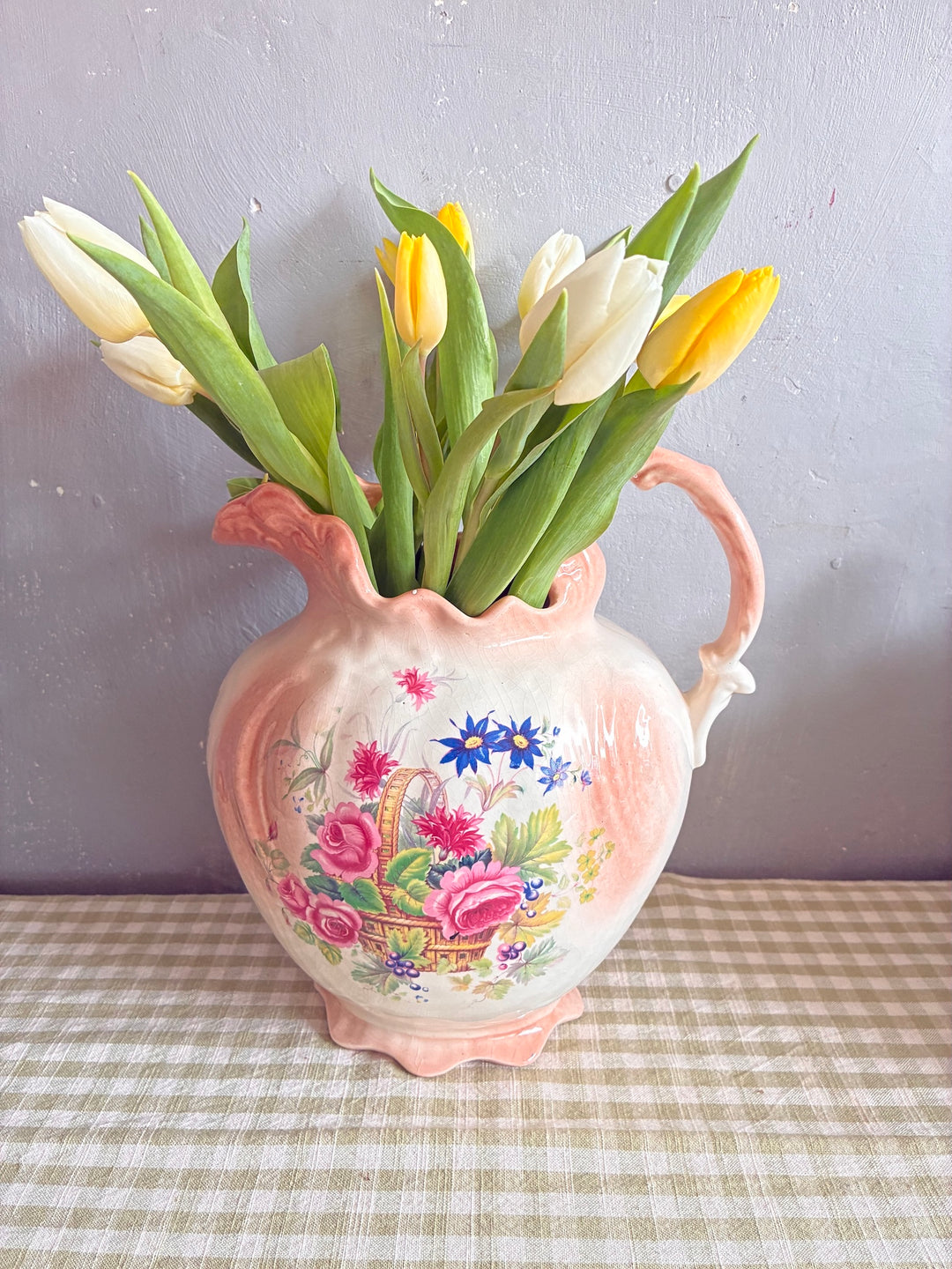 Vintage Victorian Ceramic Jug with flowers, showcasing intricate designs and a pink handle for elegant decor.