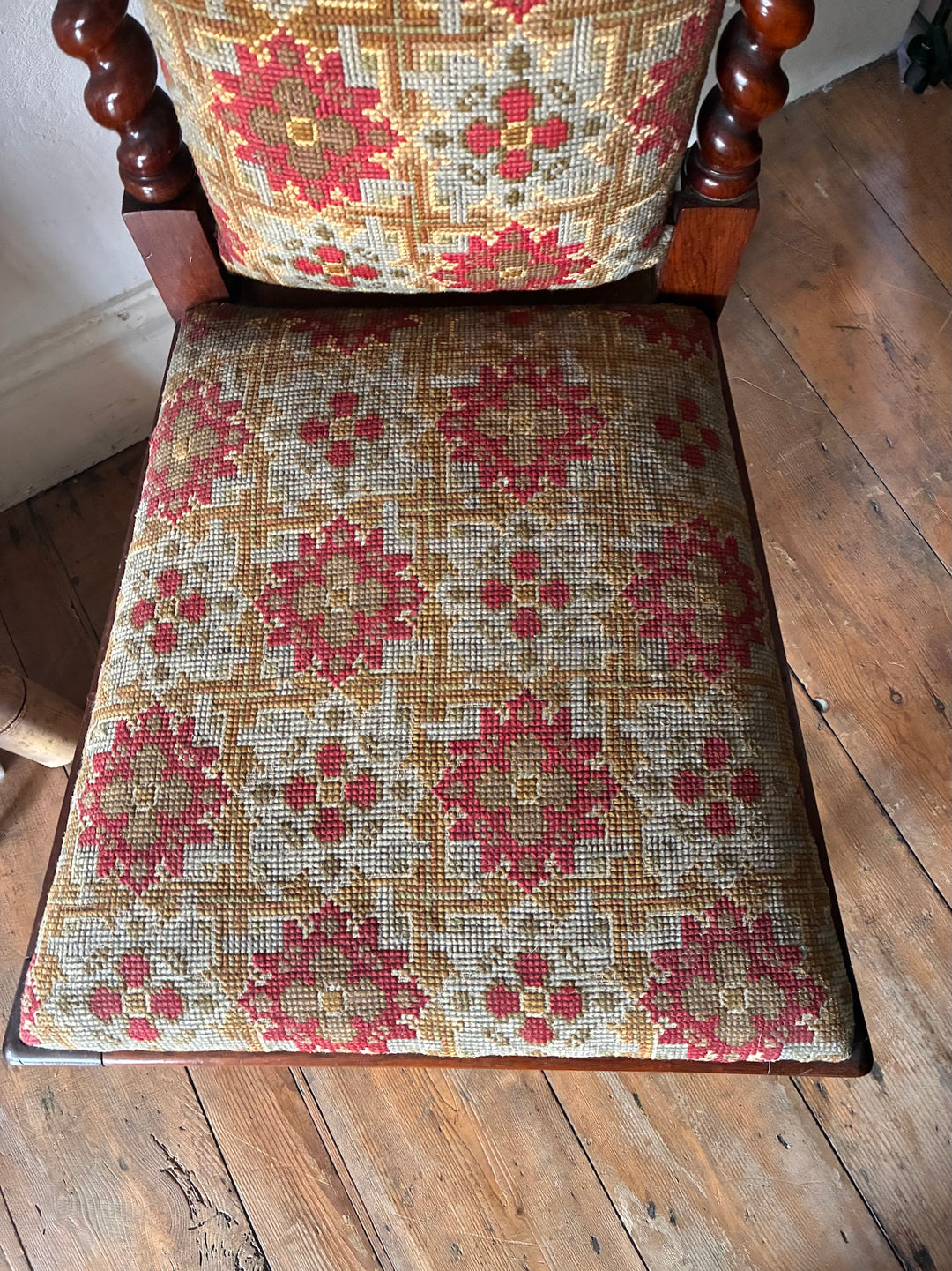 Close-up view of the original tapestry fabric on a Victorian Barley Twist Prayer Chair from Source for the Goose Devon.