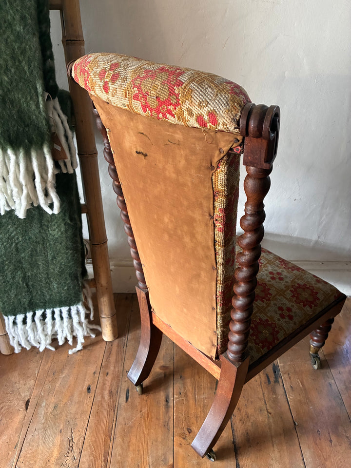 Victorian Barley Twist Prayer Chair featuring rich rosewood and original tapestry fabric.