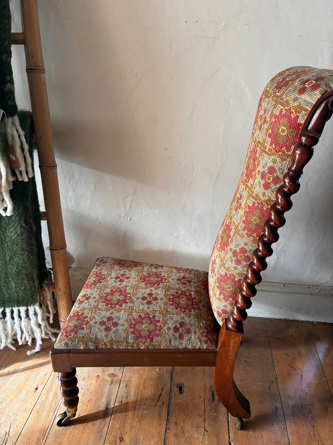 Victorian Barley Twist Prayer Chair showcasing rich rosewood and original tapestry fabric design.