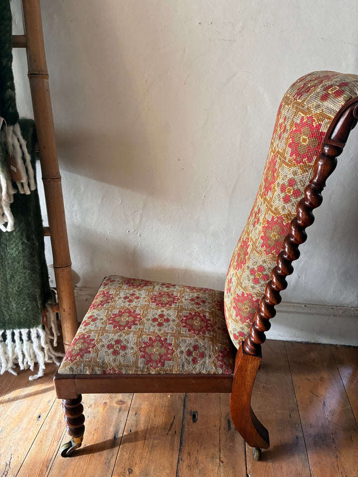 Victorian Barley Twist Prayer Chair showcasing rich rosewood and original tapestry fabric design.