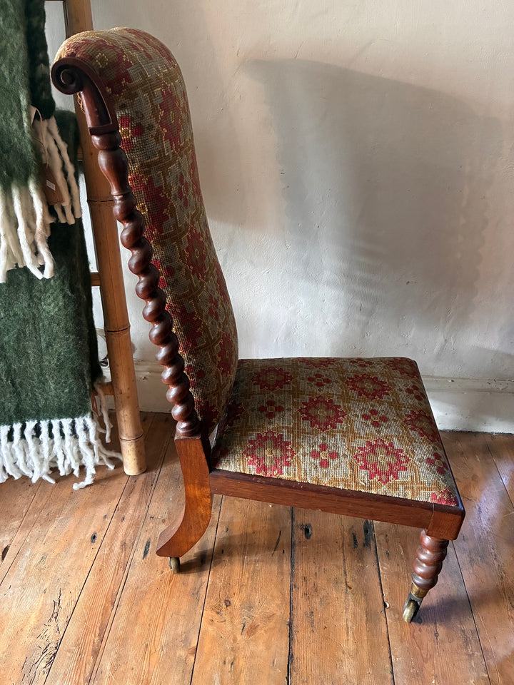 Victorian Barley Twist Prayer Chair made from rosewood with original tapestry fabric and metal castors