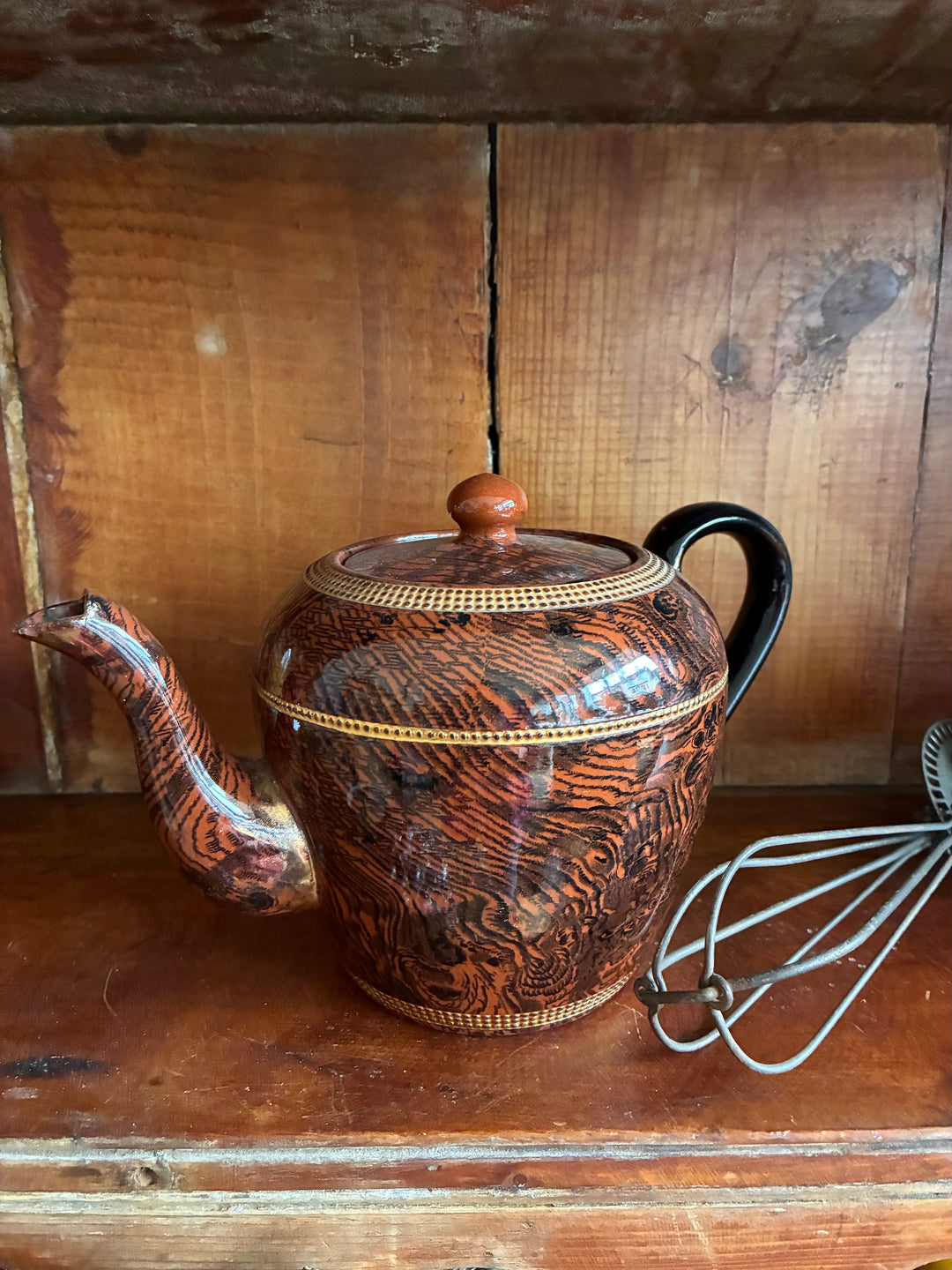 Vintage Oak Ware Design Brown Betty Teapot with bark-like pattern and gilt stripes.