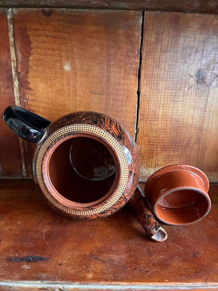 Vintage Oak Ware Design Brown Betty Teapot top view showcasing bark pattern and gilt accents. Source for the Goose Devon.