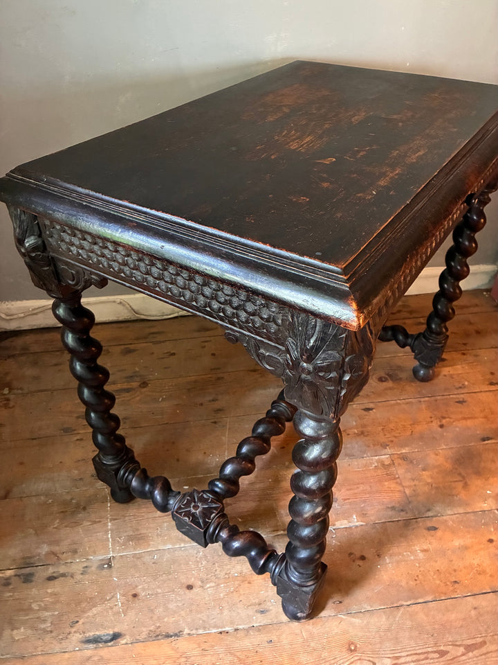 Victorian Oak Table with Barley Twist Legs showcasing intricate carvings and rich patina from Source for the Goose Devon.