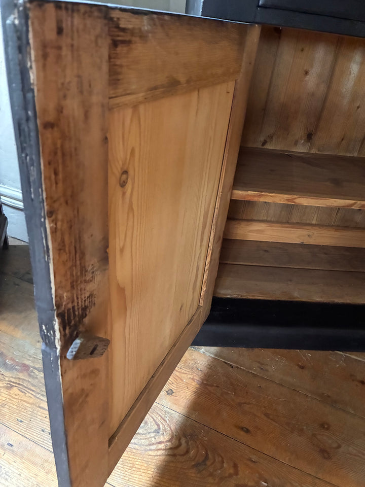 Close-up of the door of an Ebonised Victorian Pine Dresser, showcasing wood finish and craftsmanship by Source for the Goose, Devon.