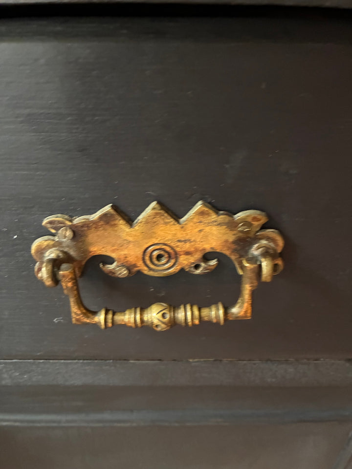 Close-up of ornate brass drawer pull on an Ebonised Victorian Pine Dresser from Source for the Goose, Devon.