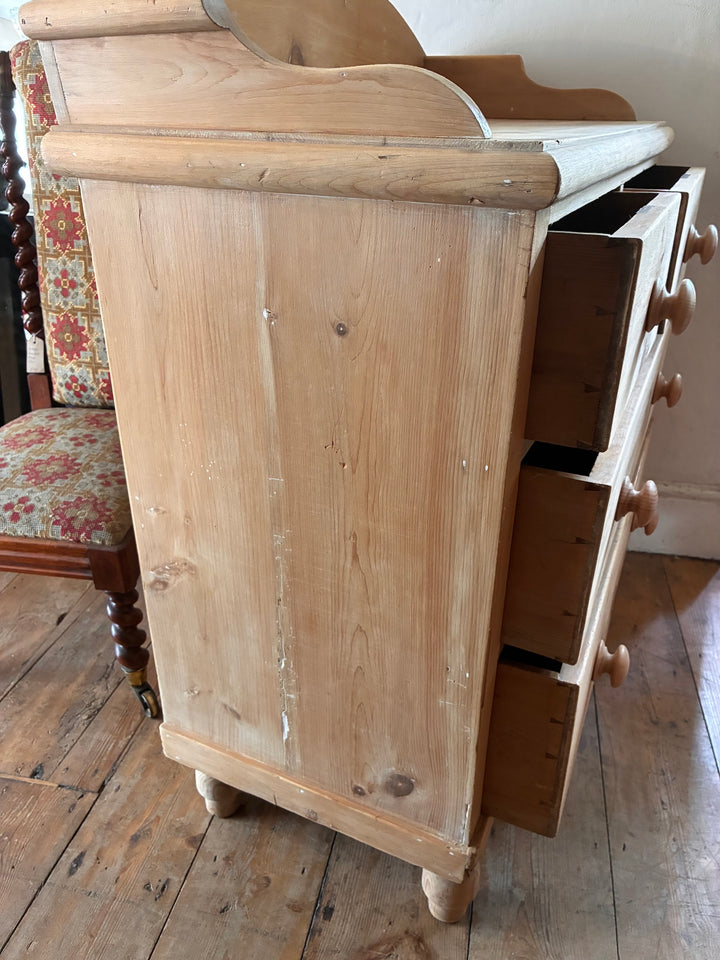 Small Antique Pine Chest of Drawers - Galleried Back showing side view, turned legs, and warm finish.