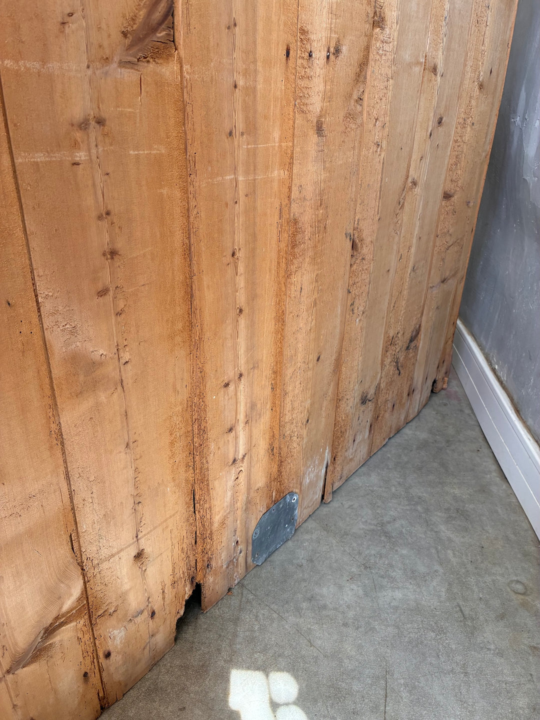 Close-up of the wooden panel detailing of the Victorian Pine Housekeepers Cupboard.