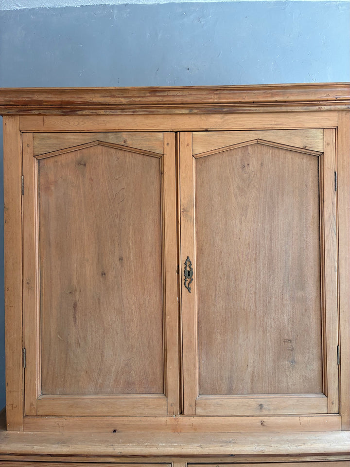 Victorian Pine Housekeepers Cupboard with detailed upper doors and original brass hardware.
