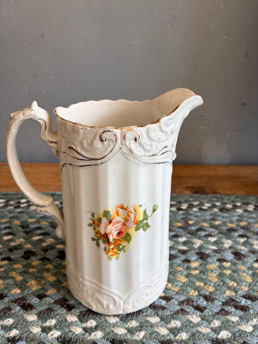 Small Edwardian China Jug with Yellow Flowers showcasing peach roses on a porcelain white background.